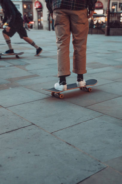 Skater jumping on his skate in skatepark