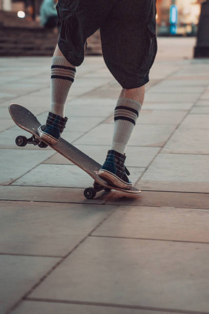 Skater jumping on his skate in skatepark