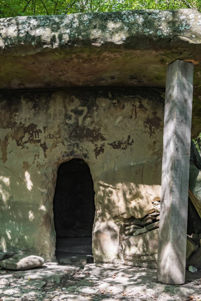 istock Narrow entrance to an ancient stone dolmen 1292268759