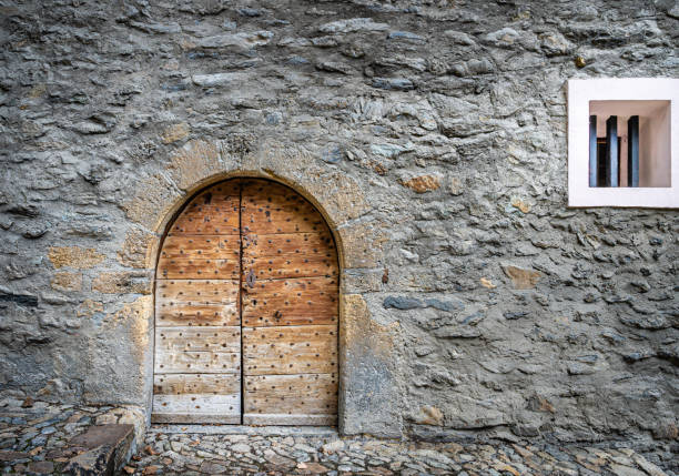 istock Old shabby wooden door 1292275218