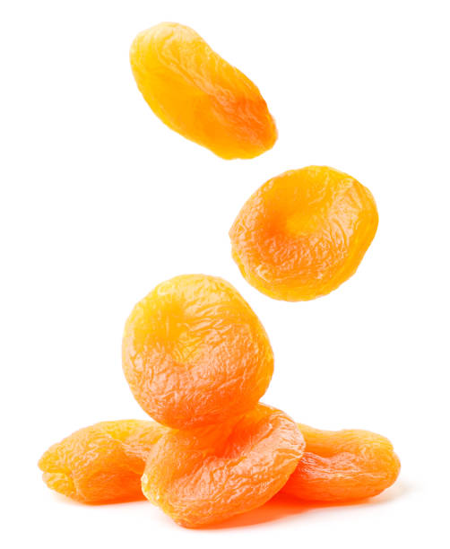 istock Dried apricots fall on a bunch on a white background. Isolated 1292275264
