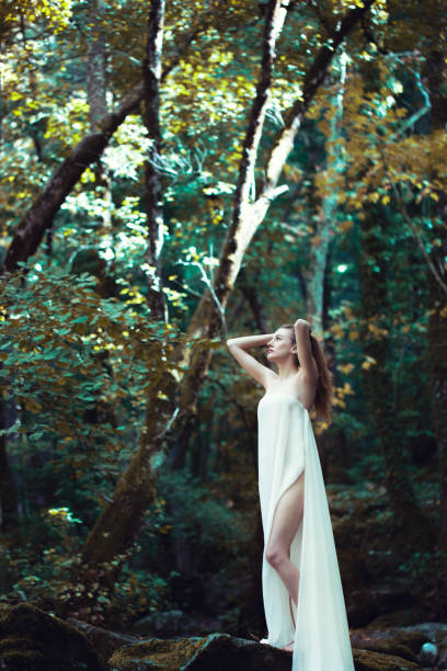 istock Fantasy woman portrait in forest 1292278011