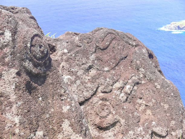 istock Rocks with rock engraving. Easter Island, traces ancient culture. 1292278037