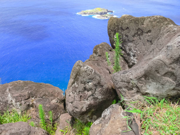 istock Rocks with rock engraving. Easter Island, traces ancient culture. 1292278041
