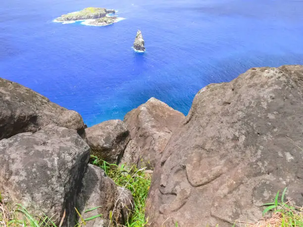 Photo of Rocks with rock engraving. Easter Island, traces ancient culture.