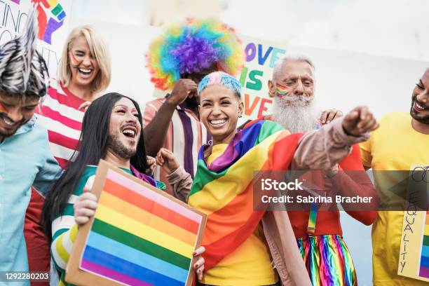 People From Different Generations Have Fun At Gay Pride Parade With Banner Lgbt And Homosexual Love Concept Stock Photo - Download Image Now