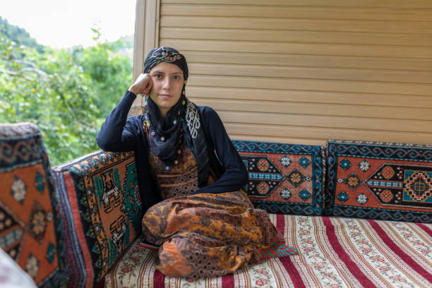 istock Young women looking at camera with  traditional clothing 1292282176