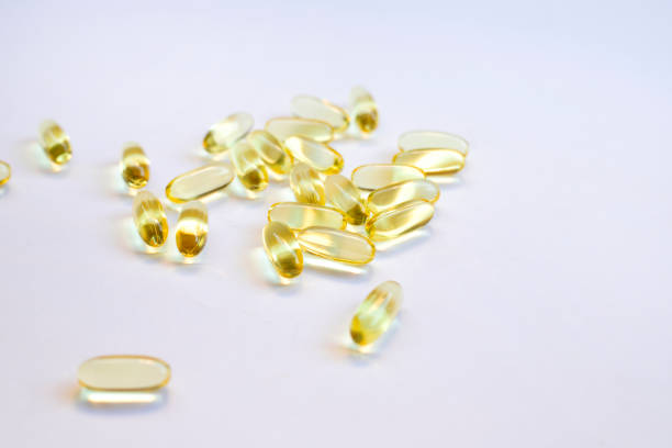 istock Omega 3 fish oil capsules isolated on a white background 1292282381
