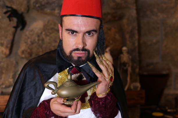istock Amazing man holding genie lamp 1292289417
