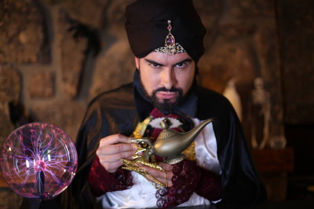 istock Amazing man holding genie lamp 1292289435
