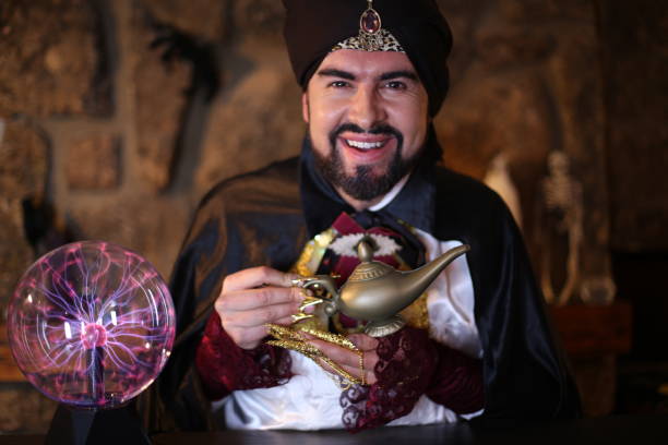istock Amazing man holding genie lamp 1292289444