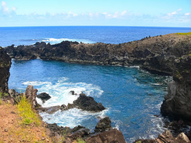 istock Easter Island coastline. Easter Island coast, rocks, ocean. 1292292021