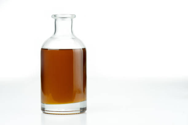 istock Vegetable oil in a glass bottle. 1292296593