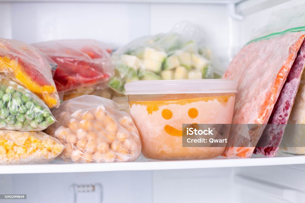 Frozen food in the freezer. Frozen vegetables, soup, ready meals Frozen food in the freezer. Frozen vegetables, soup, ready meals in the freezer Freezer Stock Photo