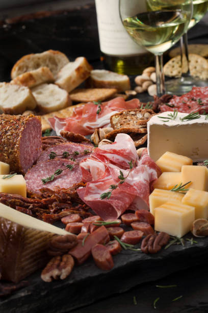 tavola salumi - wine cheese food salami foto e immagini stock