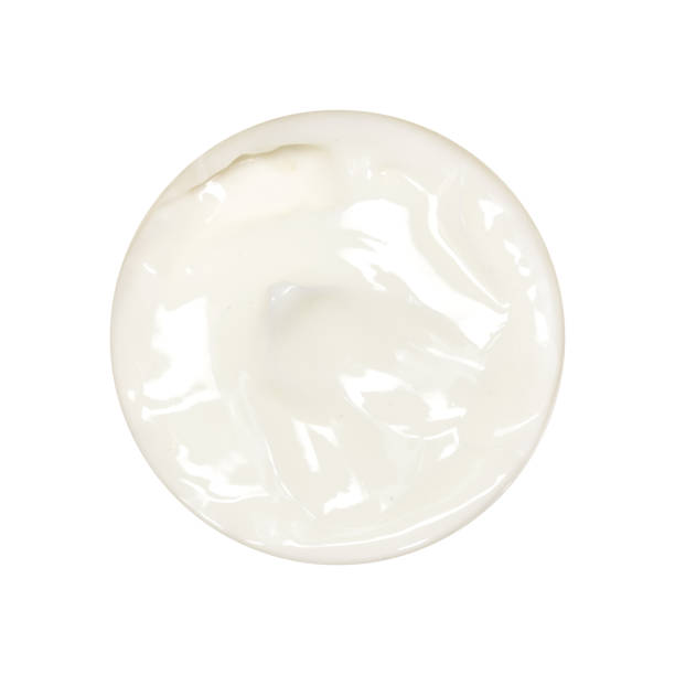 istock Cream isolated on white. A sample of cosmetics. Smear cream for face 1292303622