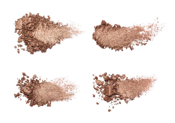 istock Set of eyeshadow sample isolated on white background. Crushed brown metallic eyeshadow. Closeup of a makeup product. 1292303689