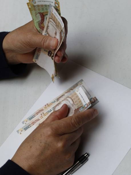 istock economy and finance with Peruvian money 1292307617