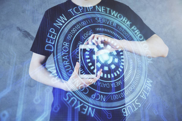 istock Double exposure of man's hand holding and using a digital device and data theme hologram drawing. Technology concept. 1292310666