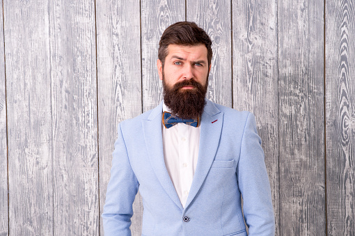 Barber shop concept. Gentleman style barber. Barber shop offer range of packages for groom make his big day unforgettable. Guy well groomed bearded hipster wear tuxedo. Hairstyle and beard grooming.