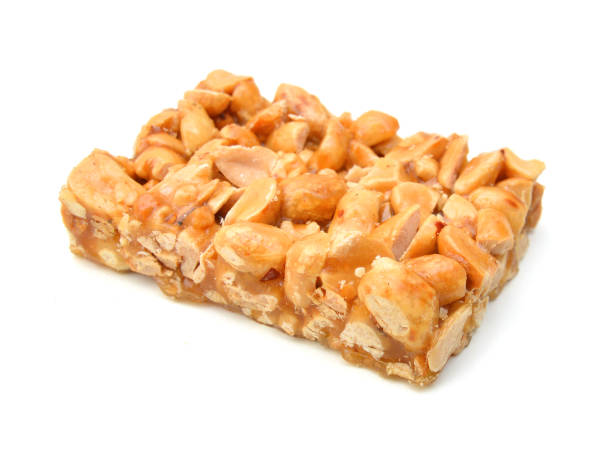 istock Honey bars with peanuts, sesame and sunflower seeds isolated 1292319653