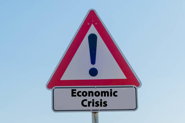 istock Warning Sign with Economic Crisis 1292325397