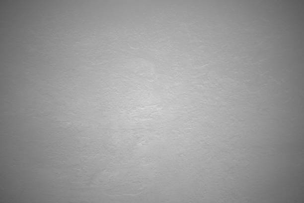 istock Cement wall background, white concrete texture for interior design, white grunge cement painted wall texture, vignette pattern, white cement stone, stucco concrete, painted wall. 1292327590
