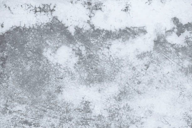 istock The cement wall background abstract gray concrete texture for interior design, white grunge cement or concrete painted wall texture, white cement stone concrete plastered stucco wall painted. 1292327592