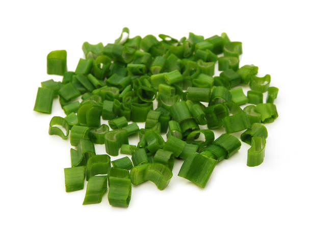 istock cut green onions on a white background 1292330951