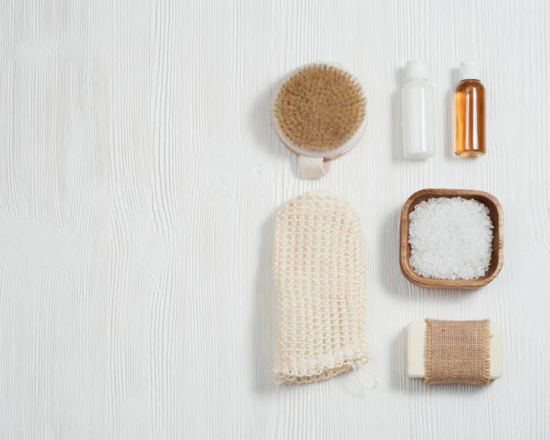 istock Bath accessories from natural material, zero waste set for bathroom, small bottles with gel and shampoo, soap, sea salt, washcloth 1292334199