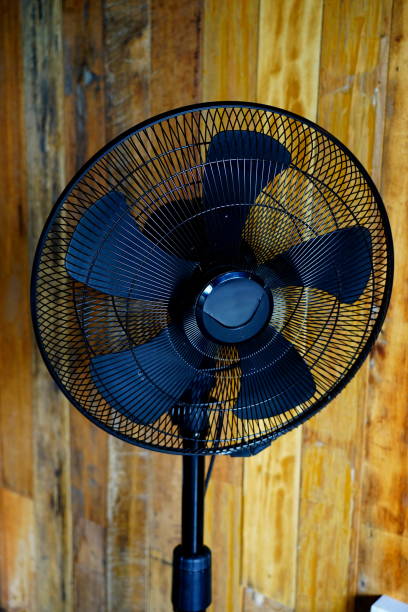 istock Close up electric floor standing fan 1292339398