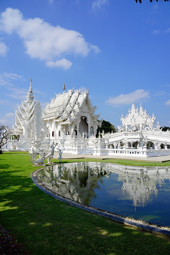 Chiang Rai, Thailand - December 05, 2020: Famous Wat Rong Khun White temple in Chiang Rai province
