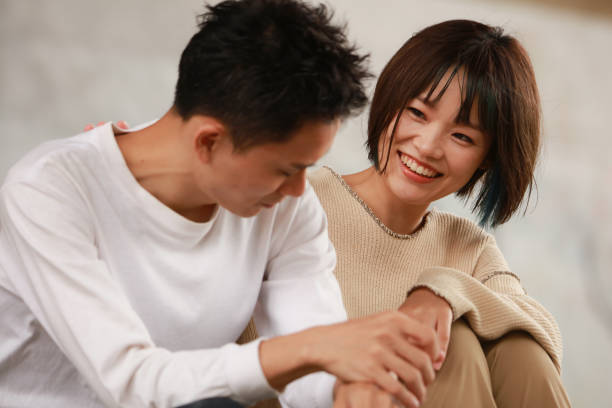 istock A woman who encourages a depressed man 1292344611