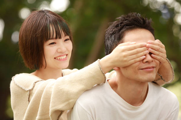 istock Woman blindfolded by hand 1292344655