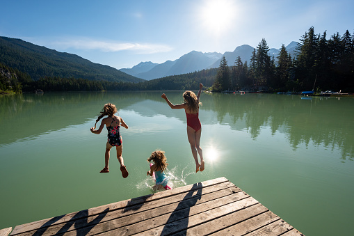 Family on a travel adventure. Best travel destinations in Canada. Top ski resorts to visit in summer.