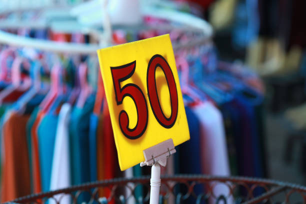 istock Promotion tag 50 in clothes shop 1292346942