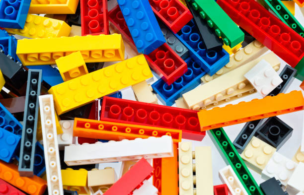 istock Heap of plastic block toy background 1292348532
