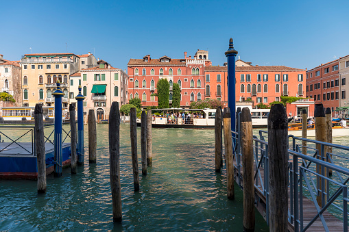Venice, Italy - August 31, 2019: Grand canal view in Venice with old building surrounding in a sunny summer day.