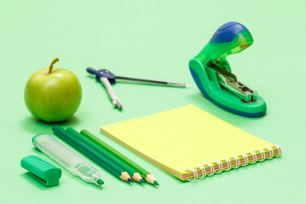 istock School supplies. Compass, color pencils, notebook, apple and stapler. 1292353874