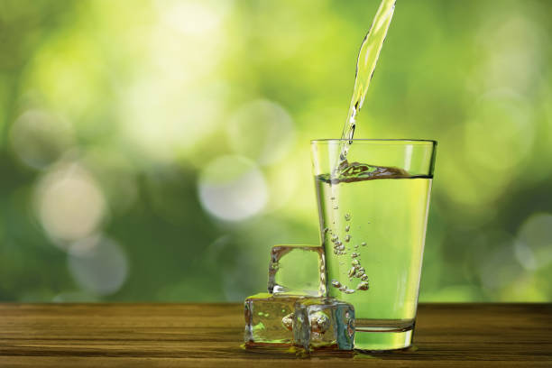istock water pouring into glass 1292356858