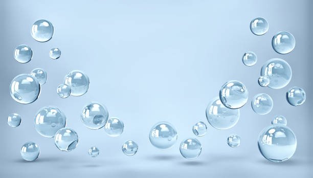 istock Abstract blue background with glass spheres, water drops 1292359512