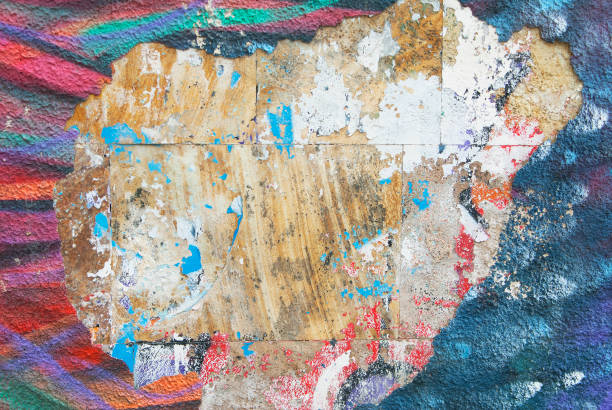 istock Abstract graffiti on a damaged wall. Color paint on the wall. 1292360123