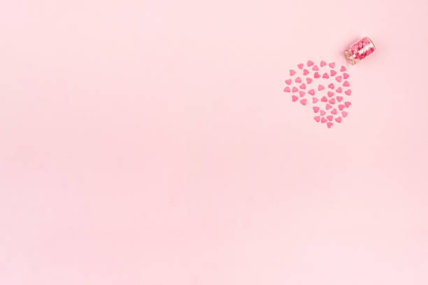 istock Sweets - hearts in small glass bottles. 1292361688