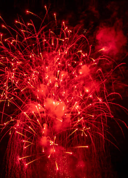 istock Fireworks light up  at New Year Eve. Abstract Festive background with fireworks sparkles. Copyspace