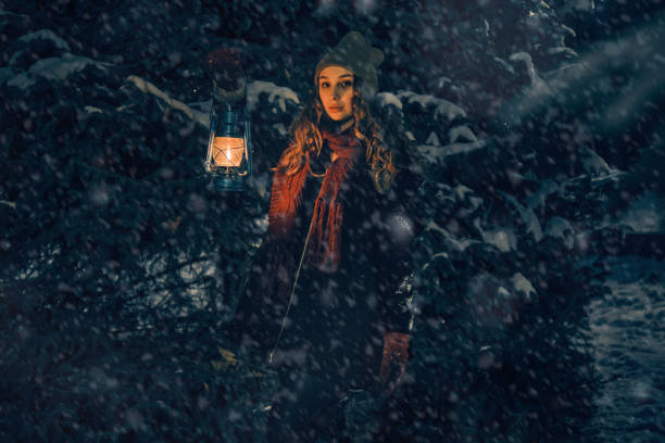 istock Young girl in winter forest fairy tale 1292362946