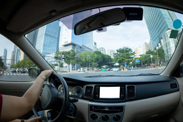 istock Driving car on city road 1292365753