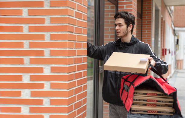 istock Courier to deliver food to building site 1292365882