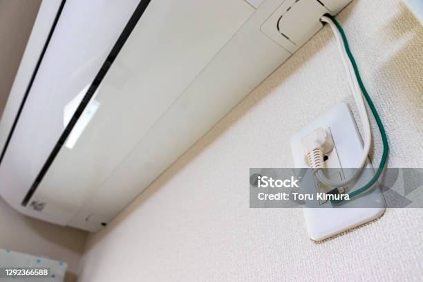 Power Plug Of Air Conditioner Connected To Electrical Outlet Stock Photo -  Download Image Now - iStock