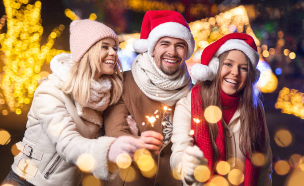 istock Cheerful friends having fun during Christmas celebration 1292367006