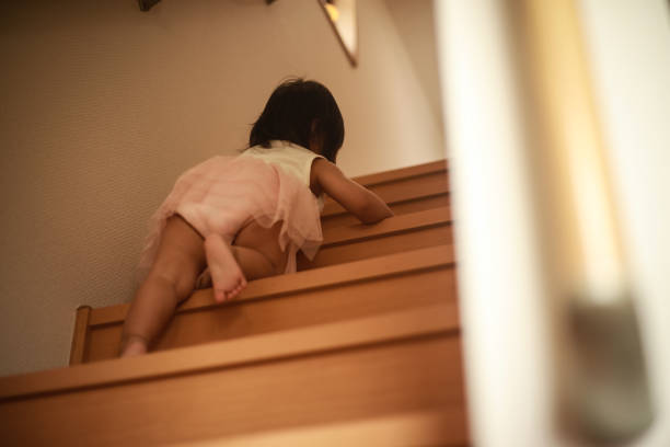 istock Girl climbing stairs alone 1292369356